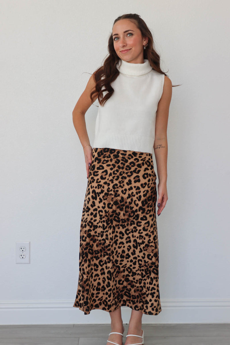 girl wearing leopard print skirt