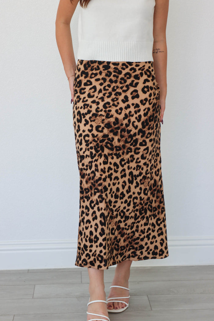 girl wearing leopard print skirt