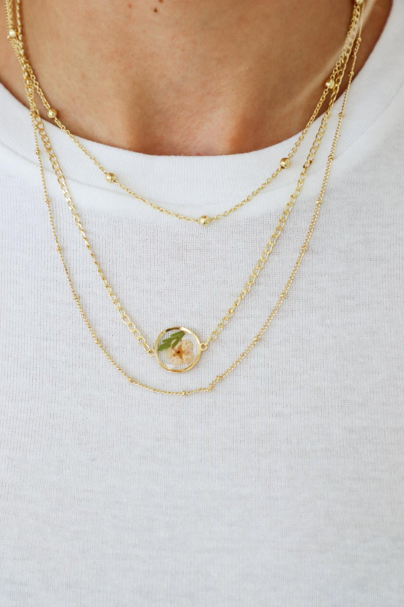 gold chain layered necklace with resin flower charm