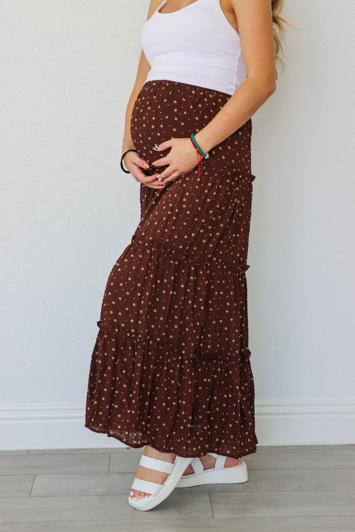 girl wearing dark brown floral maxi skirt