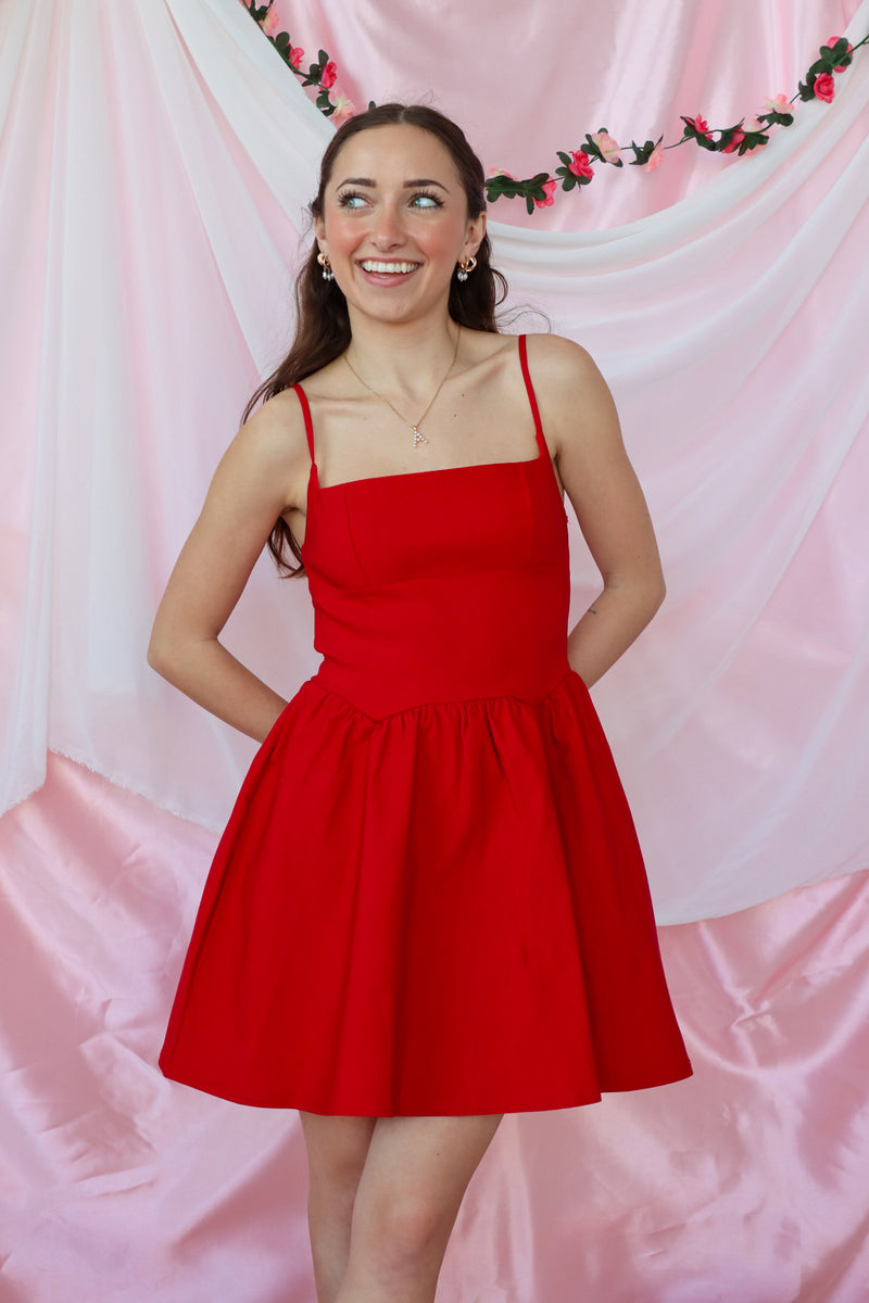 girl wearing red short dress