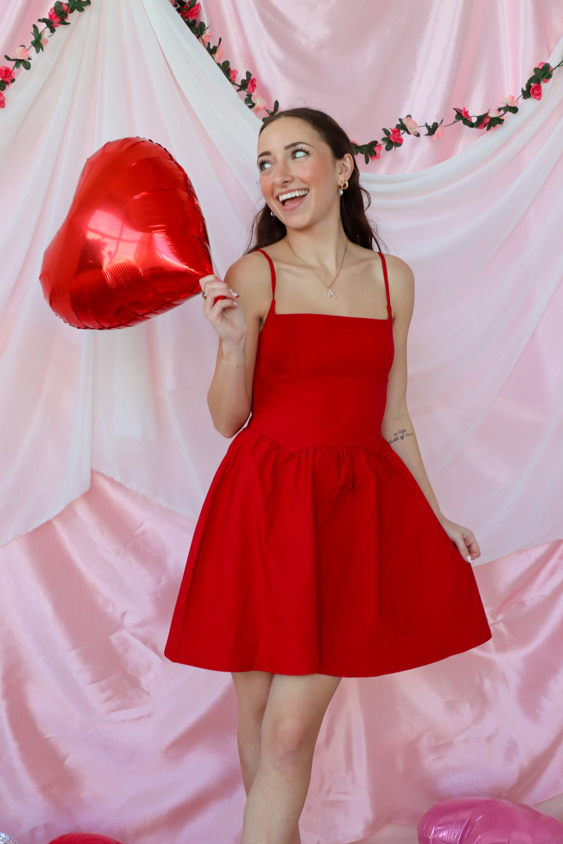 girl wearing red short dress