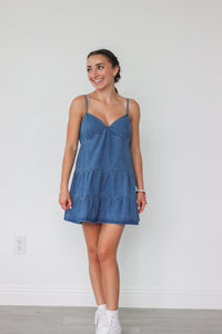 girl wearing denim short summer dress