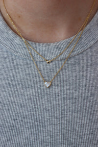 gold and white heart necklace