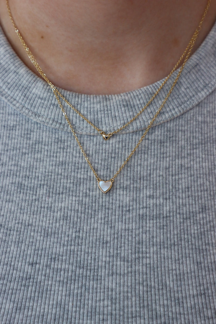 gold and white heart necklace