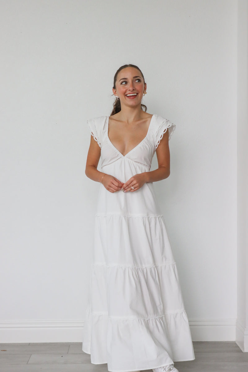girl wearing long white dress