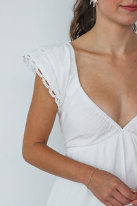 girl wearing long white dress
