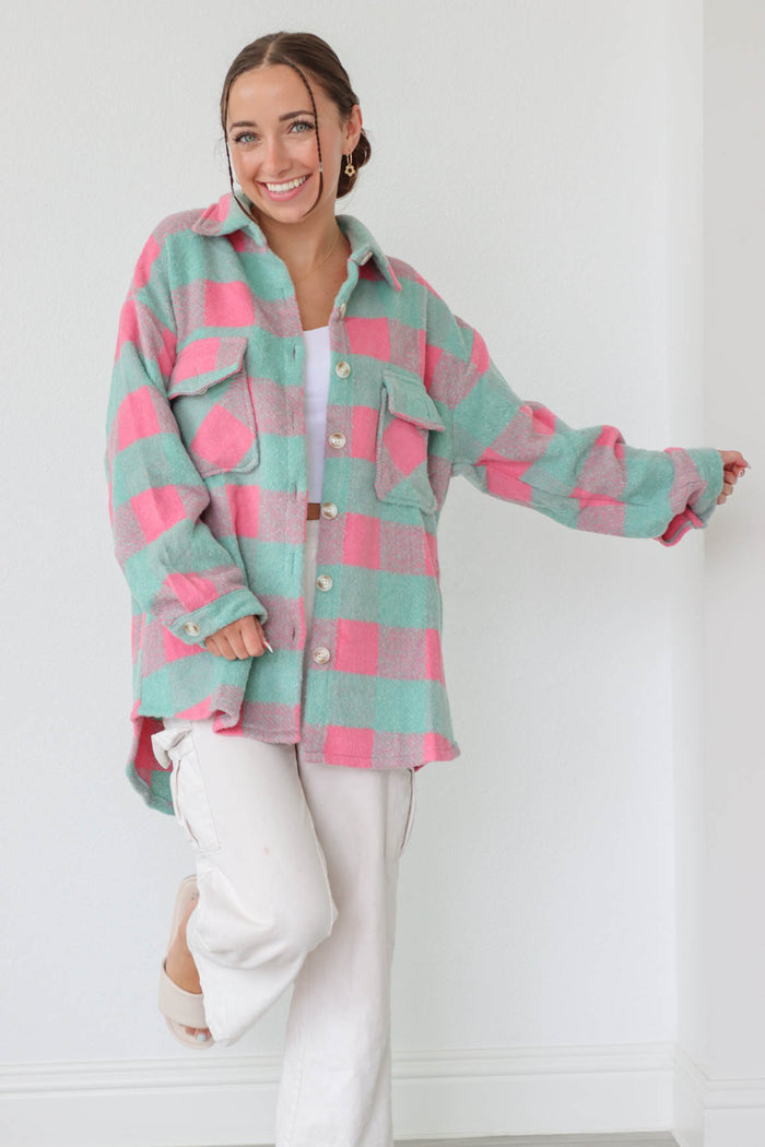girl wearing pink and blue plaid flannel jacket