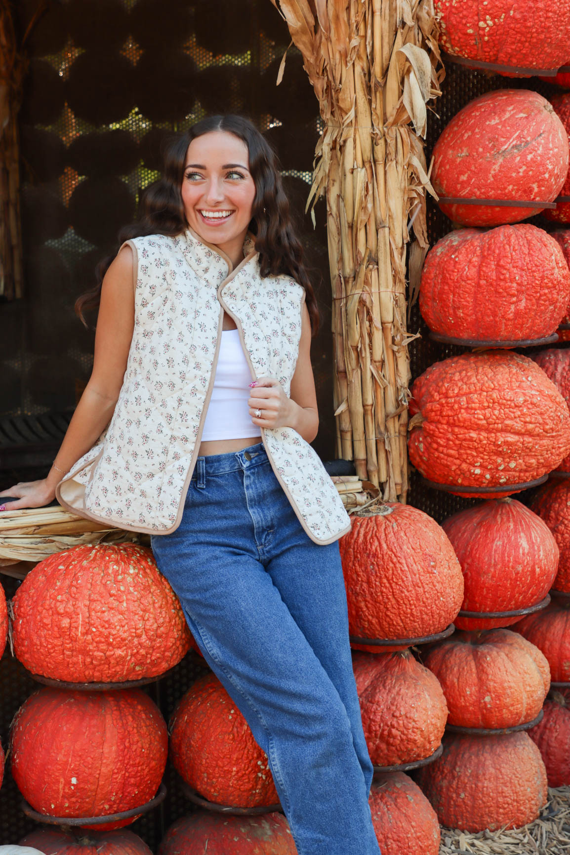 girl wearing cream quilt vest