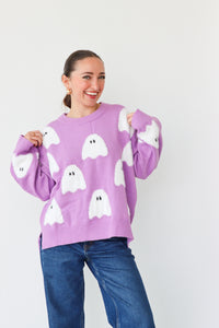 girl wearing purple ghost sweater