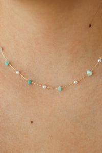 gold dainty necklace with blue stone beads