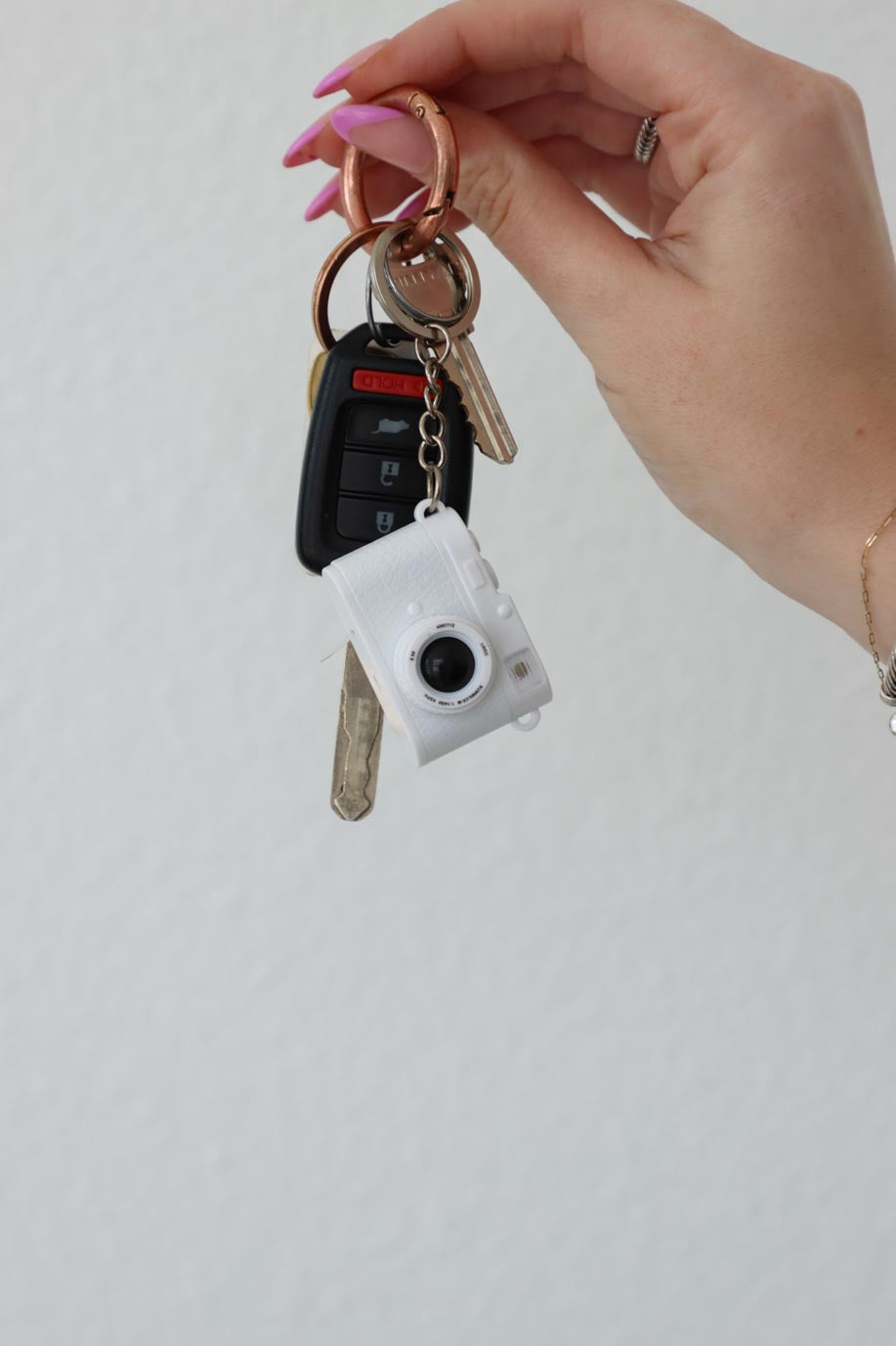 white camera keychain