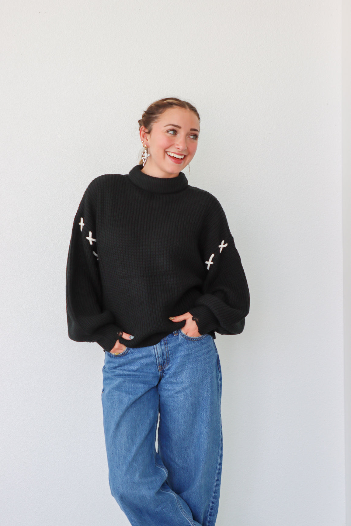 girl wearing black turtleneck sweater