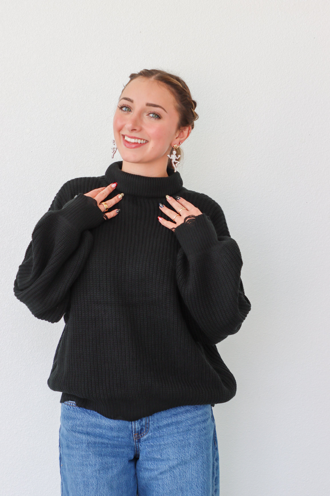 girl wearing black turtleneck sweater