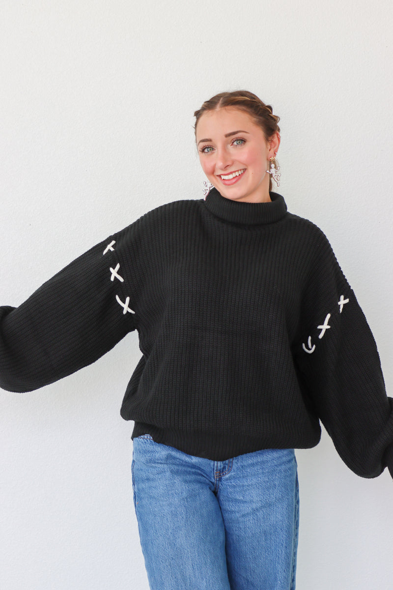 girl wearing black turtleneck sweater