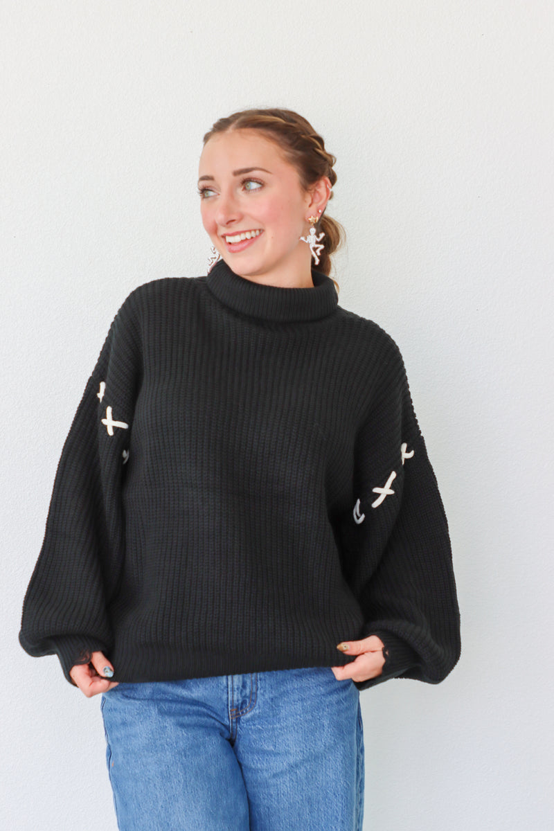 girl wearing black turtleneck sweater