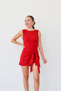 girl wearing red athletic dress