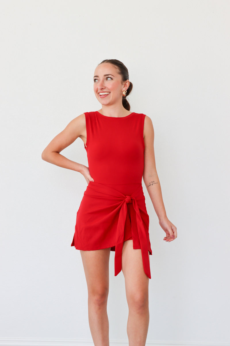 girl wearing red athletic dress