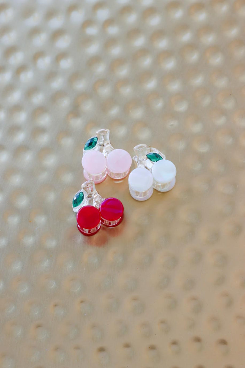 red, pink, and white small cherry hair clips, sold as a set of 3