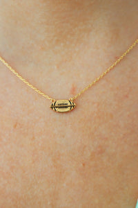 gold football necklace