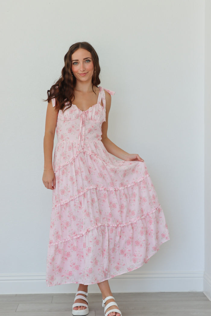 girl wearing light pink floral long dress