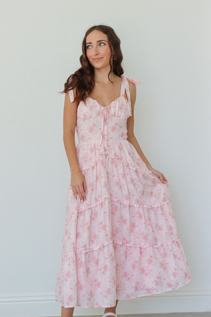 girl wearing light pink floral long dress