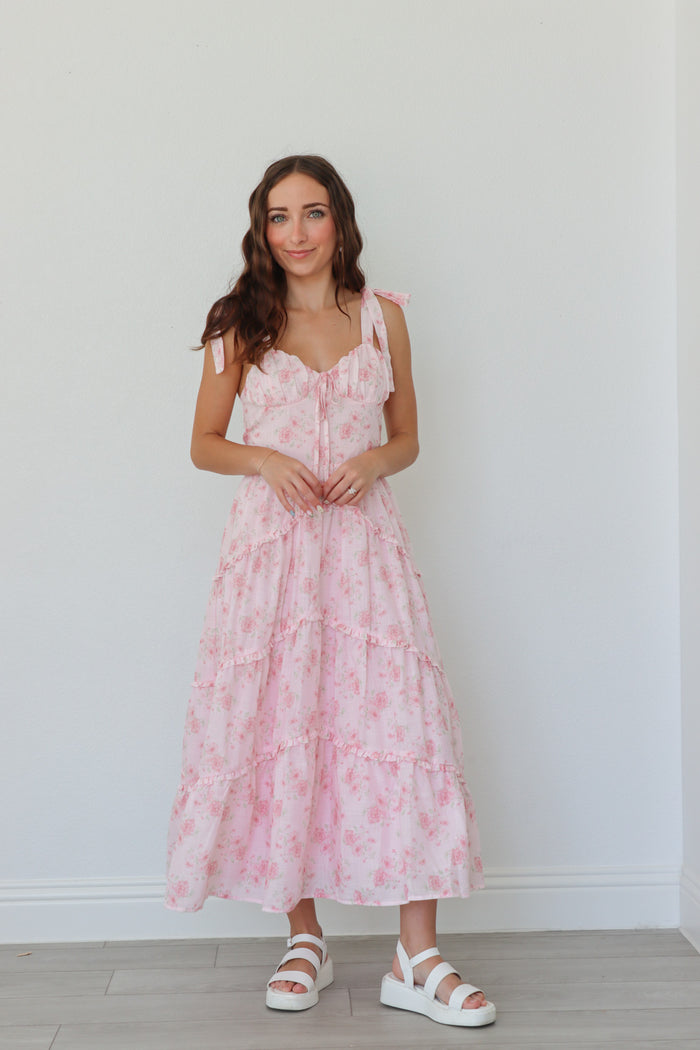 girl wearing light pink floral long dress