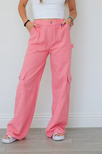 girl wearing hot pink cargo pants