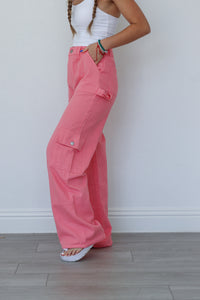 girl wearing hot pink cargo pants