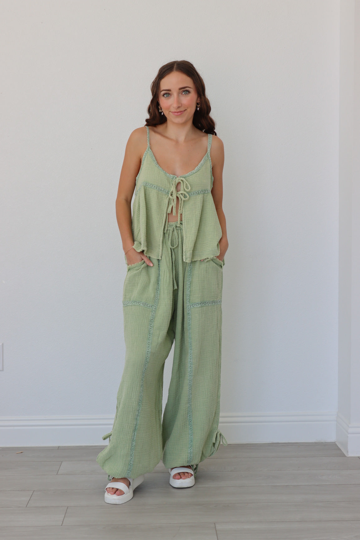 girl wearing sage green linen matching set