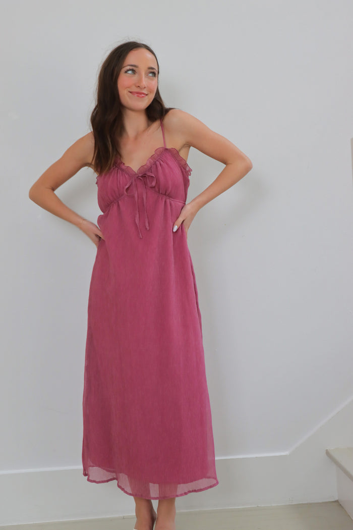 girl wearing plum long dress