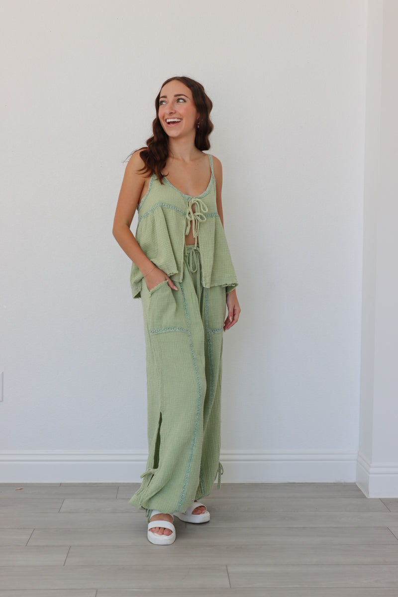 girl wearing sage green linen matching set