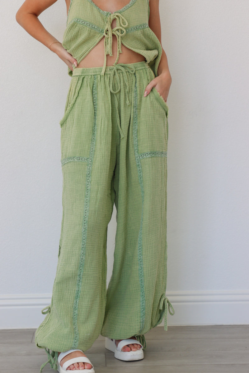 girl wearing sage green linen matching set