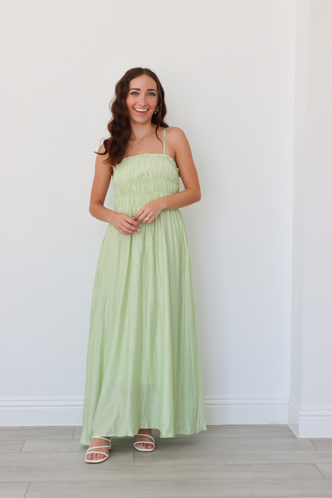 girl wearing lime green long dress