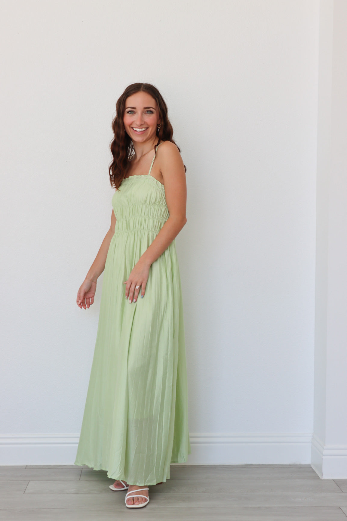 girl wearing lime green long dress