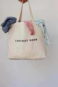 "lash next door" canvas tote bag