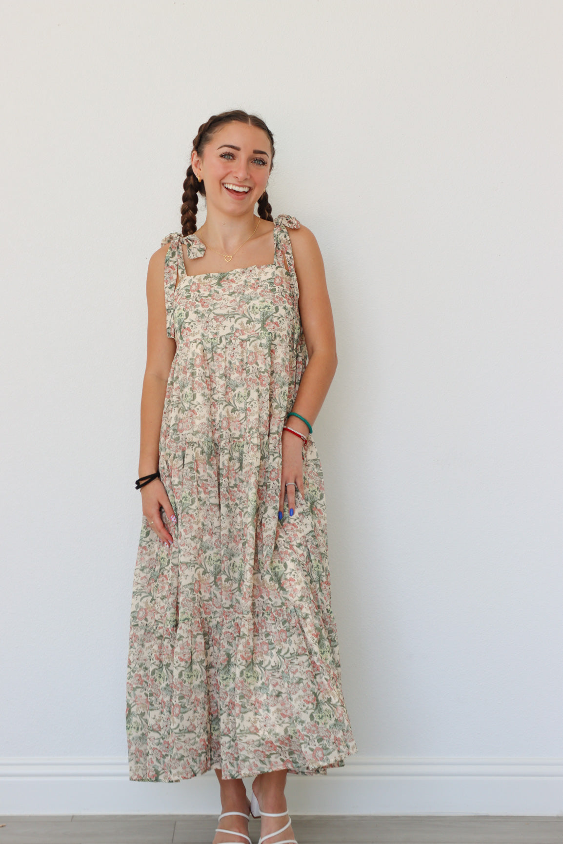 girl wearing multicolor long floral dress