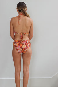 girl wearing floral bikini - sold with wrap skirt