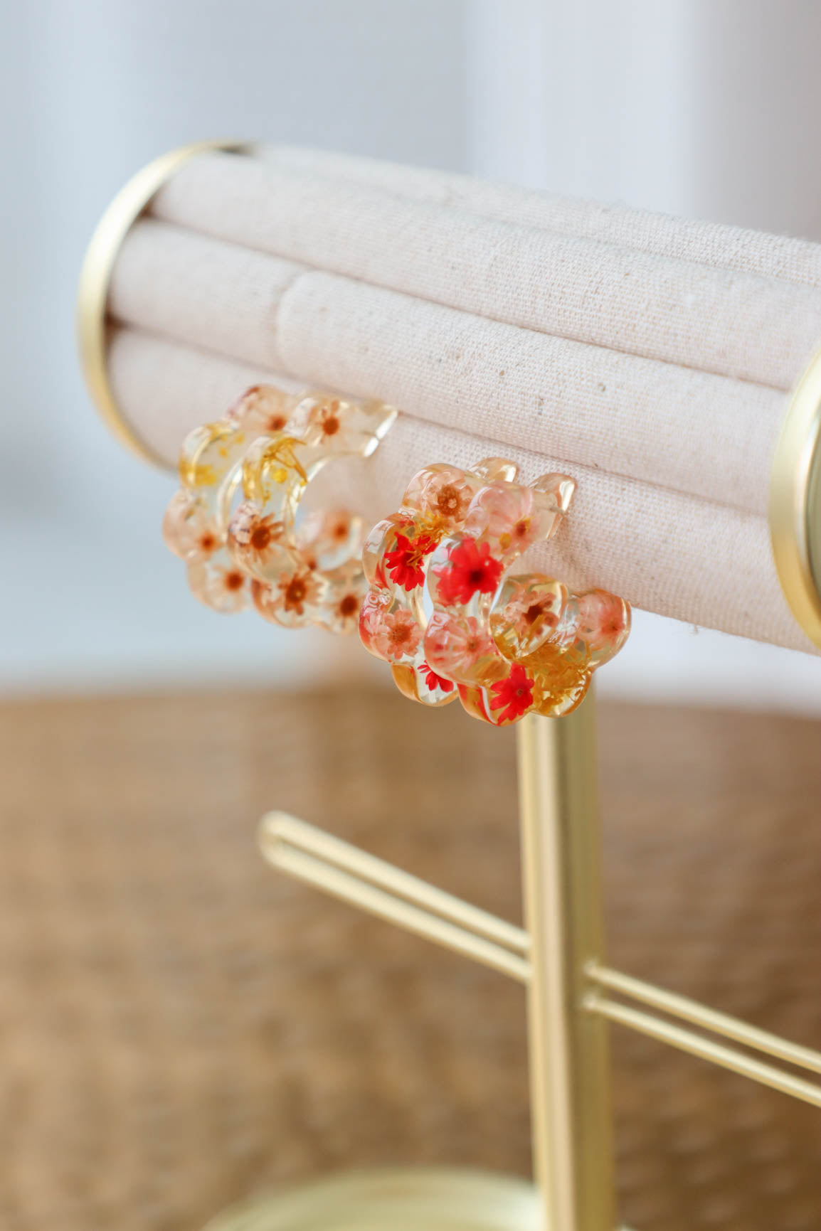 red and yellow resin floral hoop earrings