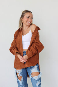 girl wearing brown corduroy button down jacket