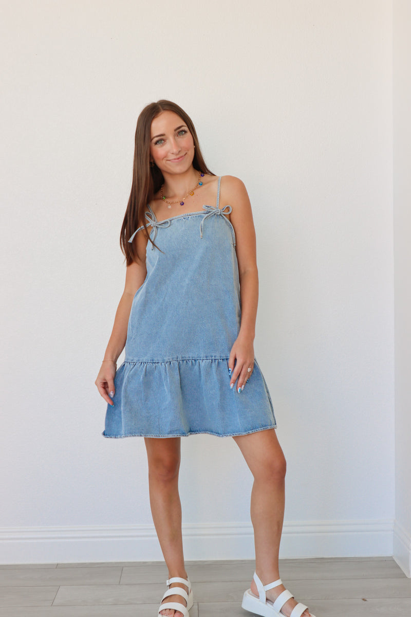 girl wearing denim short dress