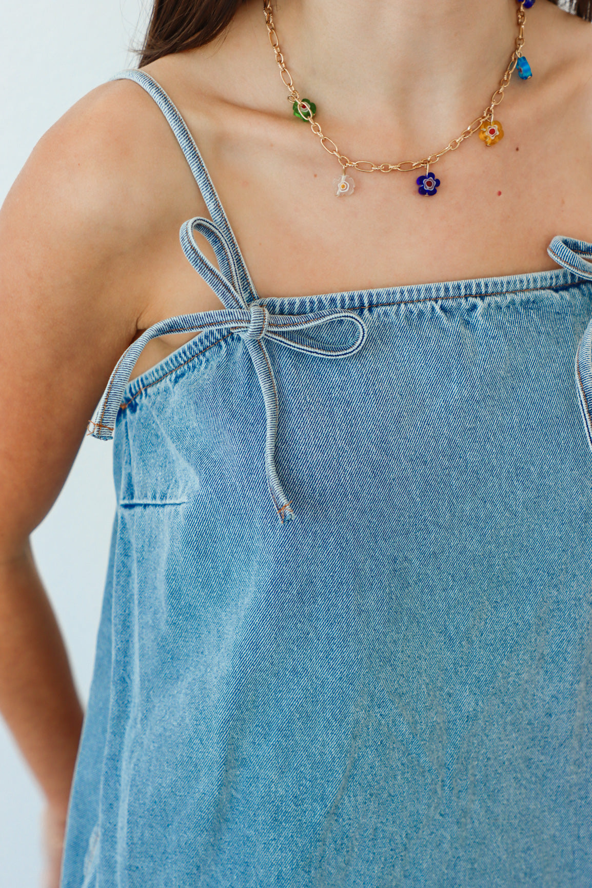 girl wearing denim short dress