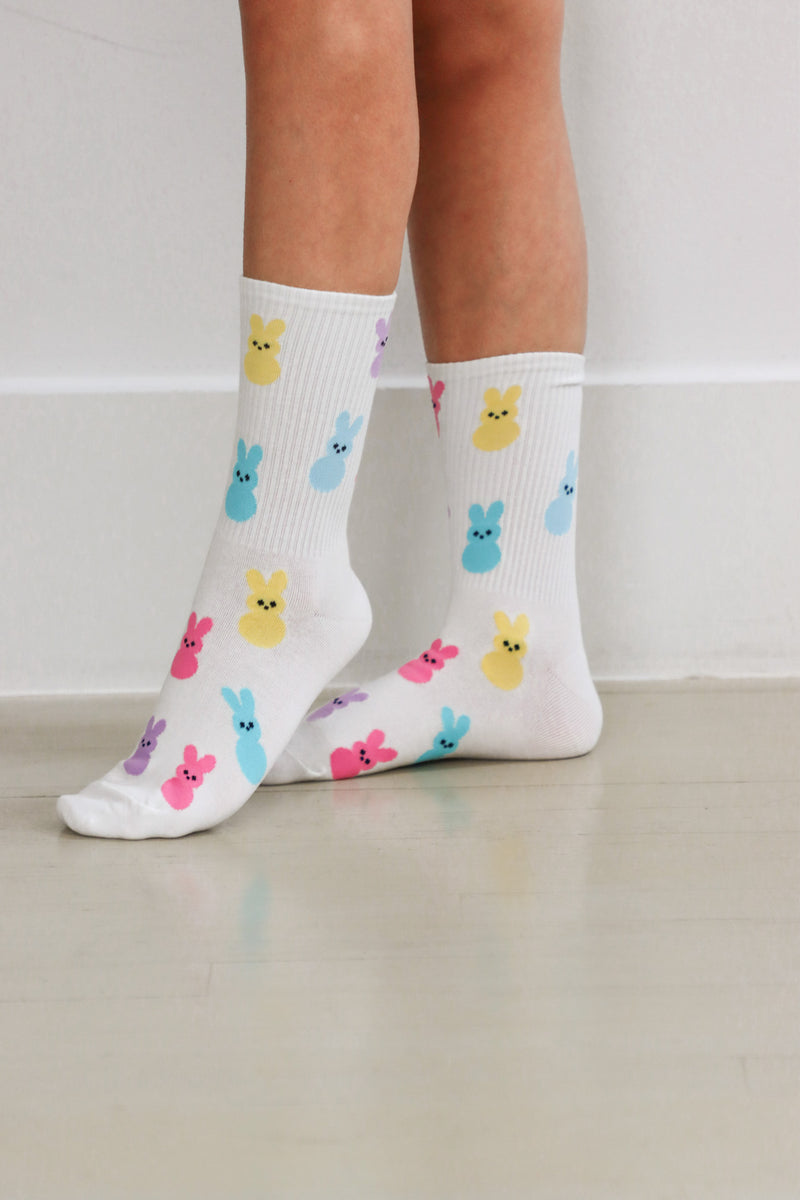 girl wearing white peeps easter socks