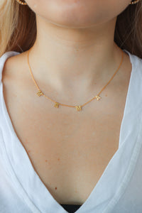 gold "mama" necklace