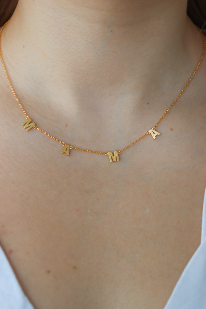 gold "mama" necklace