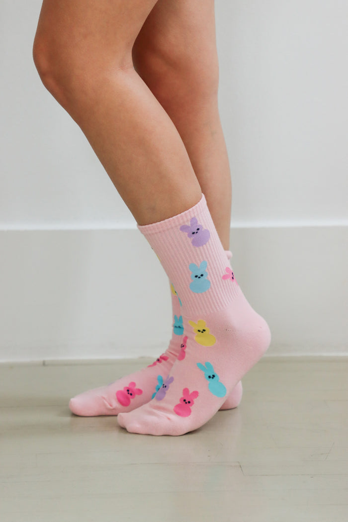 girl wearing pink peeps easter socks