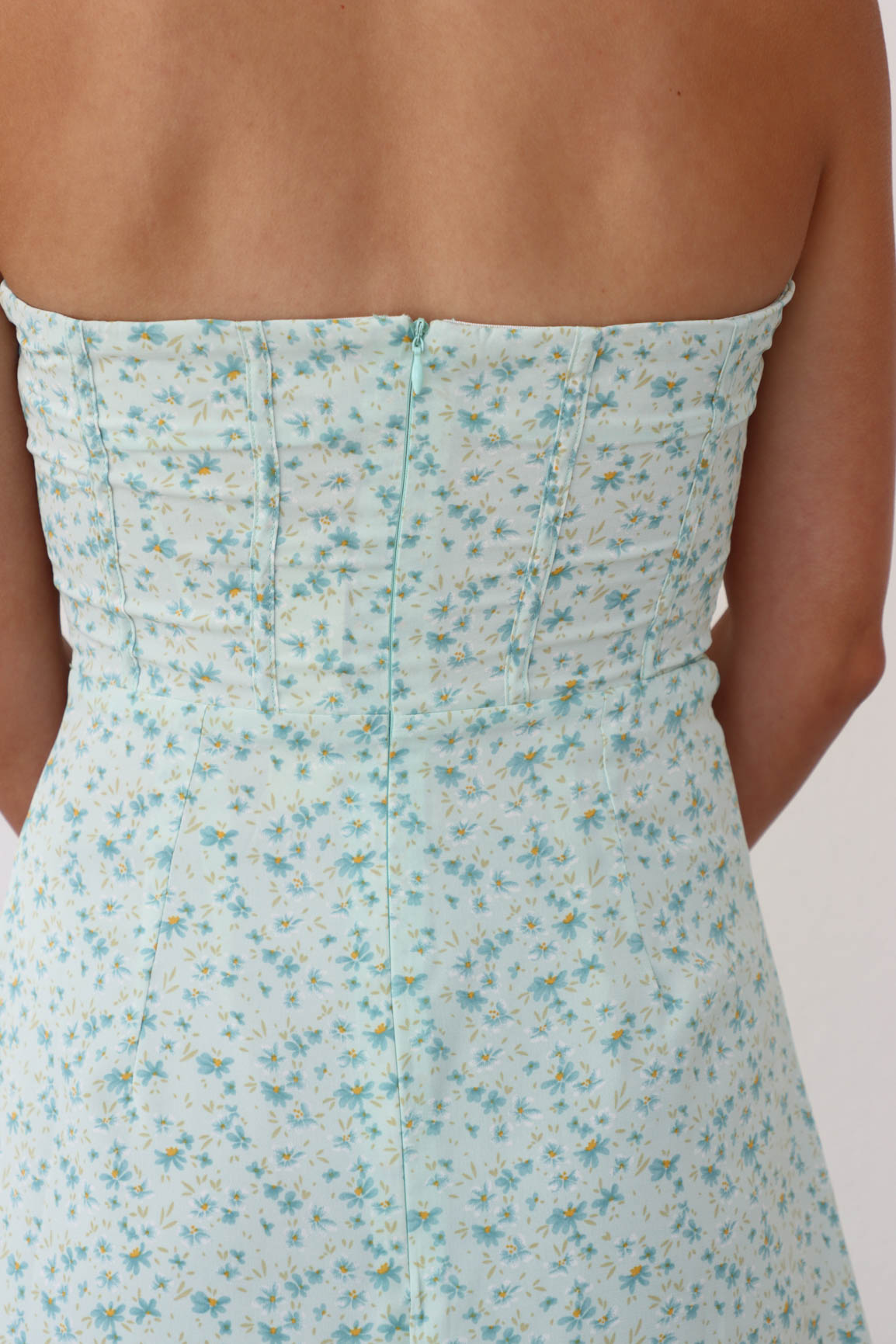 back zipper on light green floral corset strapless dress