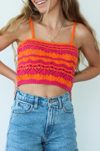 girl wearing pink and orange crochet knit tank top
