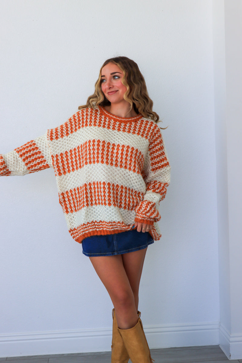cream & orange striped sweater