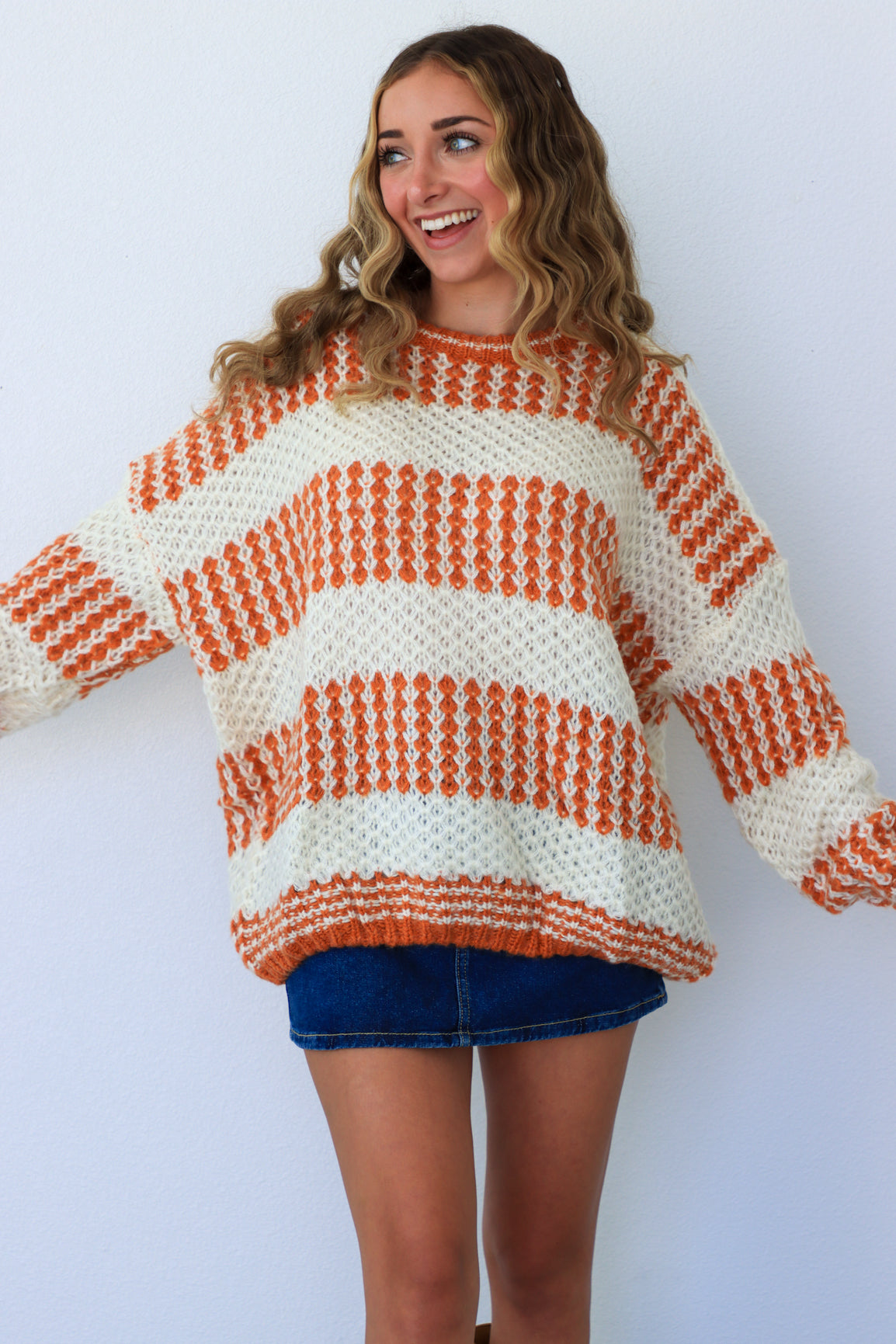 cream & orange striped sweater
